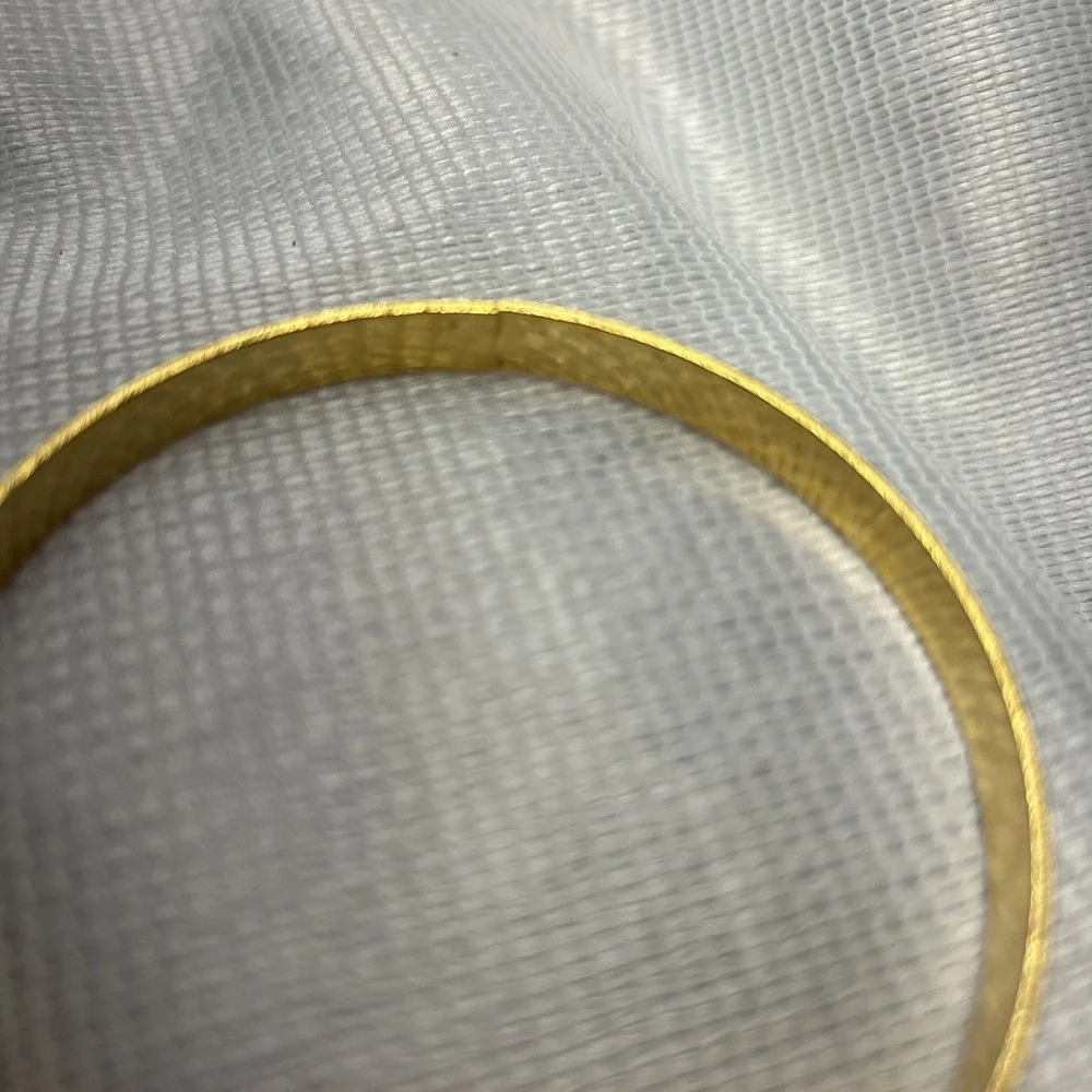Gold Tone Heart Engraved Bangle Bracelet Measuring 2 3/4 Inches Across